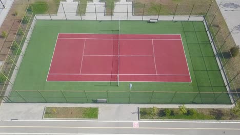 the goal of tennis is to hit the ball over the net into the other player's court