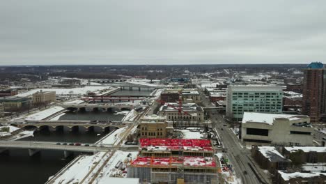 high aerial view of bridges in des moines, iowa in winter