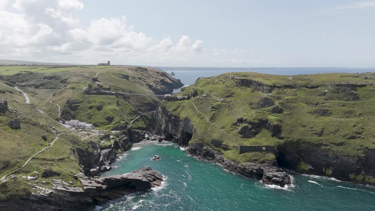 Stunning Aerial View of Cornwall Coastline with Bridge and Ruins