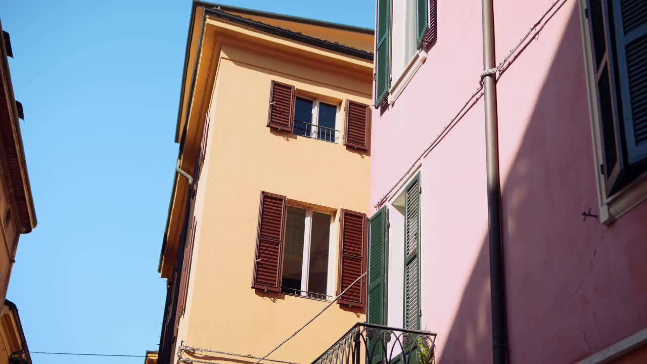 Colorful Italian Townhouses with Shutters and Balconies