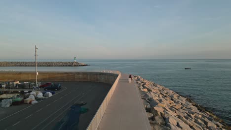 aerial footage of coastline arenys de mar barcelona, two people in view