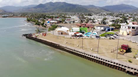 aerial slow motion footage of a small pier