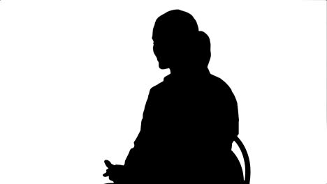 silhouette doctor have a positive conversation with a patient, sitting