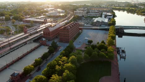 aerial of historic wilmington delaware train station beside christina river, largest city in state, made famous by train travel by vp joe biden