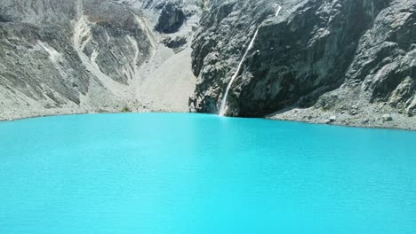 Laguna-69-in-Huaraz-Peru-incredible-view-of-a-dreamy-place-vivid-blue-lagoon-in-the-Peruvian-Andes---Tourism-in-high-altitudes-beyond-Machupichu