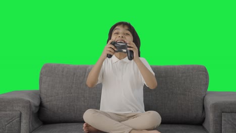 Happy-Indian-boy-wins-a-match-in-video-game-Green-screen