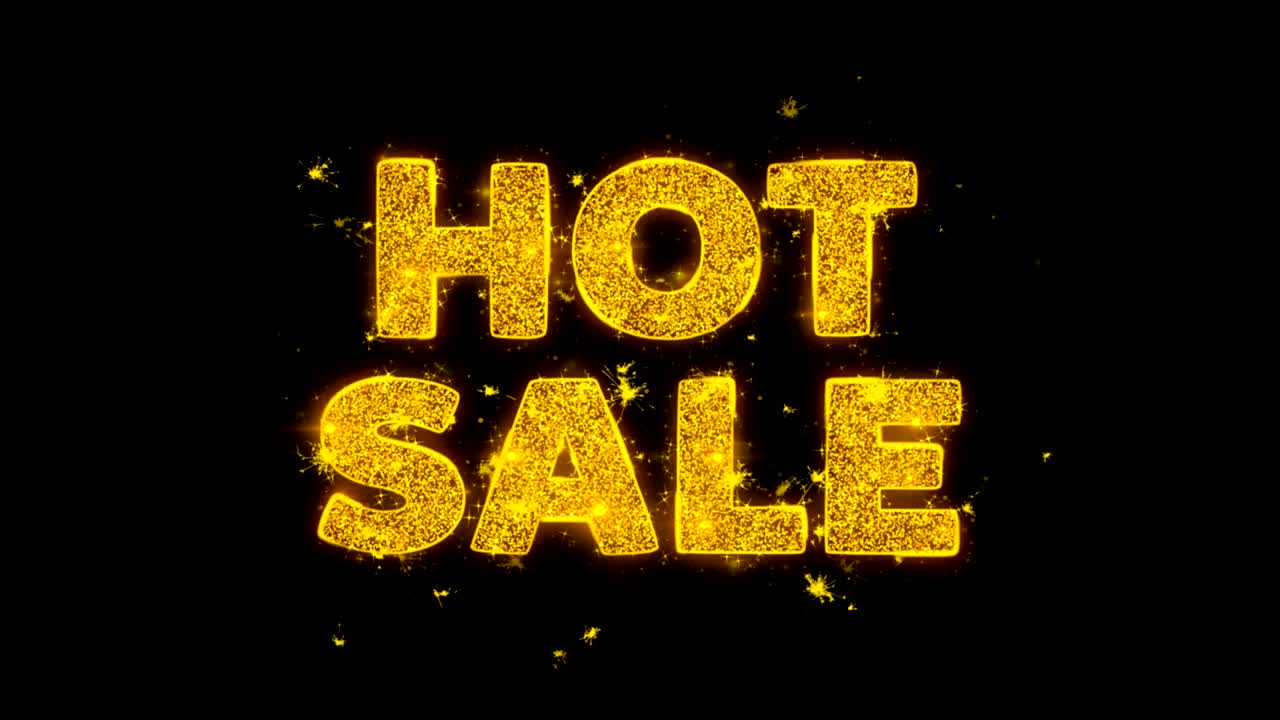 el texto de venta en caliente hace chispas en el fondo negro.