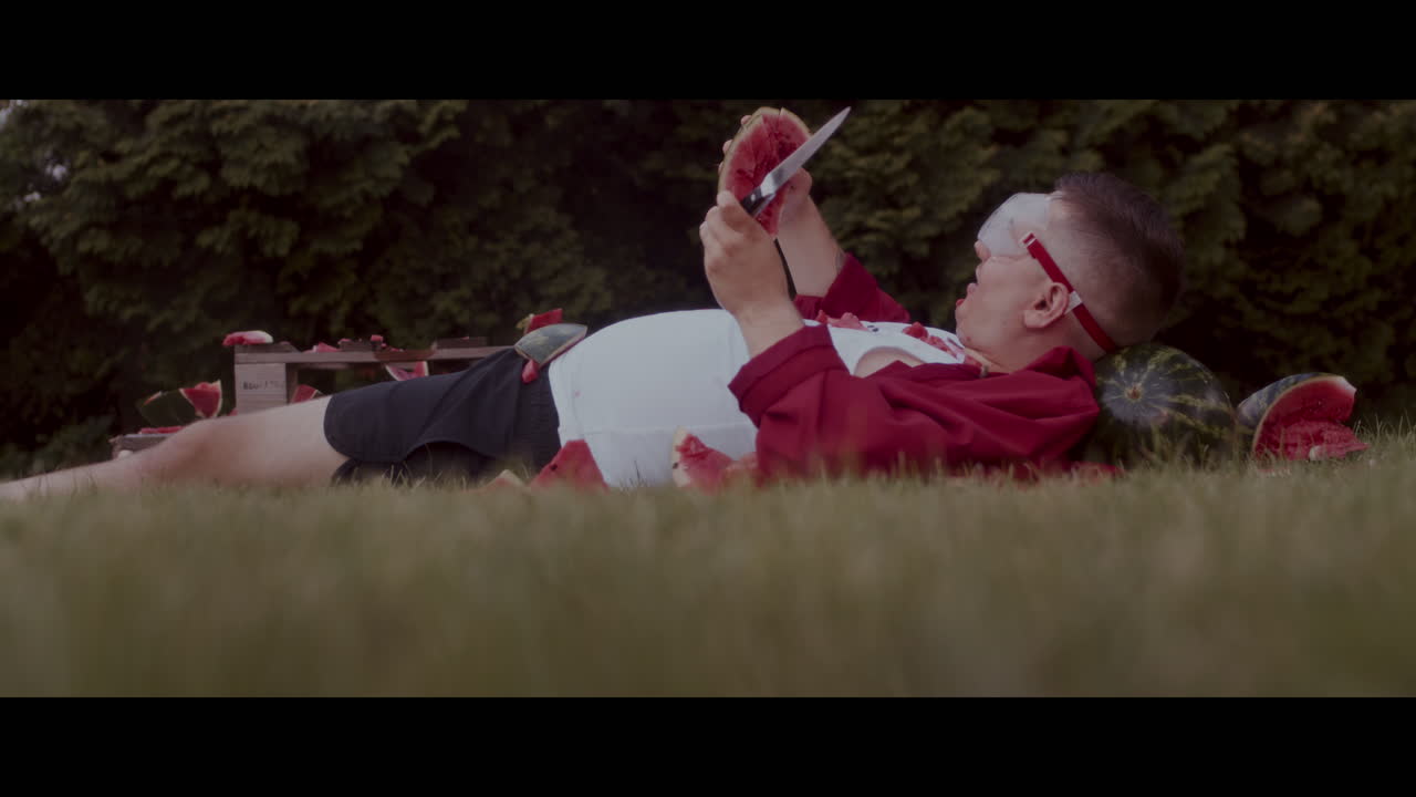Man Eating Watermelon in a Funny Way