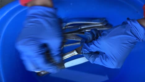 cleaning silverware in a bowl