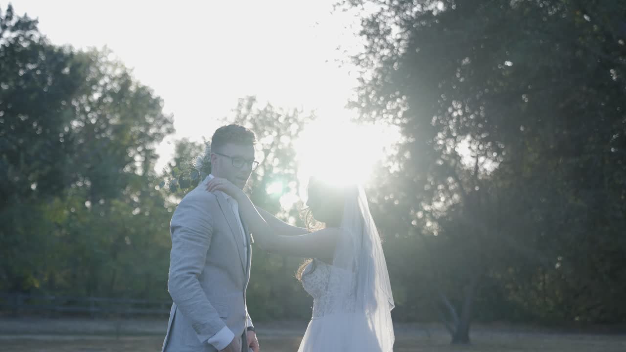 A groom picks his bride up off the ground to kiss her.  Email willneathery yahoo.com to purchase the entire wedding event,both raw and edited, at cheap wholesale pricing.