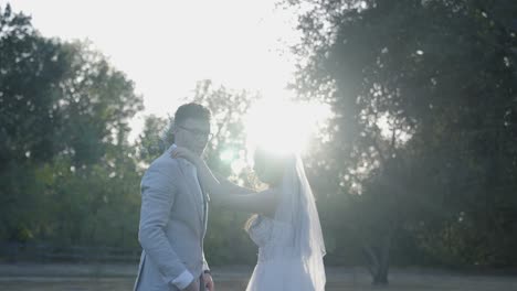 a groom picks his bride up off the ground to kiss her.  email willneathery yahoo.com to purchase the entire wedding event,both raw and edited, at cheap wholesale pricing.