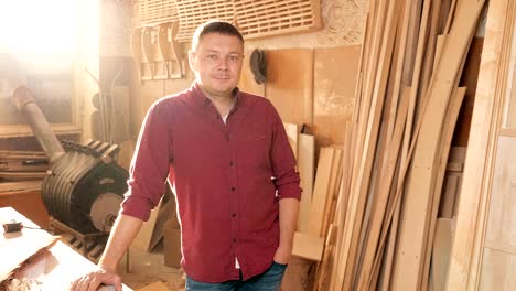 carpenter portrait at his workplace.