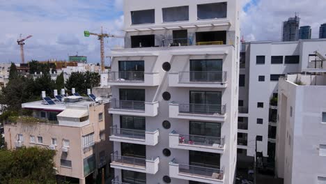 Tilt-down-shot-of-buildings-and-highways-around-Bublick-Street-in-the-city-of-Tel-Aviv,-Israel