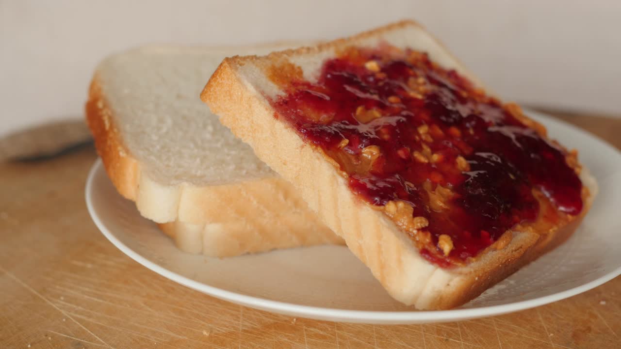 peanut butter and jelly, jam sandwich rotating, turning round, closeup, macro