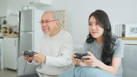 grandparent and grandchild playing video games