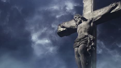 jesus on the cross on a dark cloud background