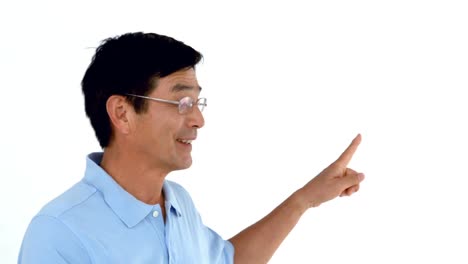 Smiling-man-with-eyeglasses-pointing-