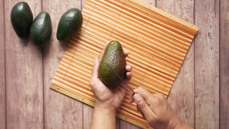 cutting an avocado