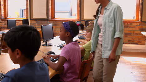 pupils in computer class at school