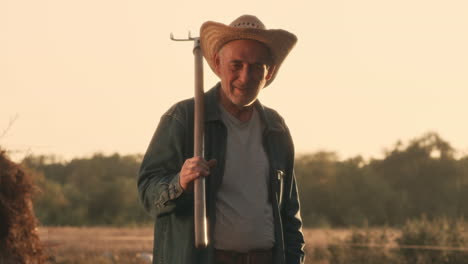 senior farmer at sunset