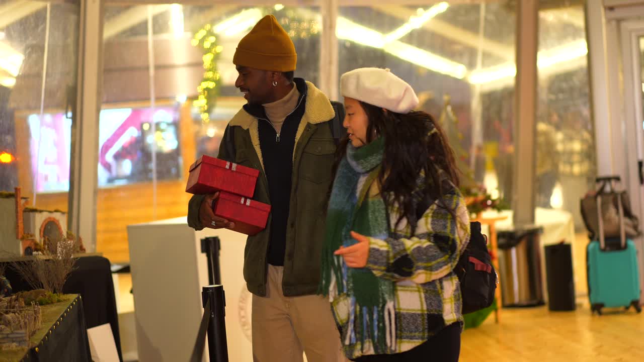 Couple shopping for gifts at a fair