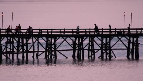 The-Mon-Bridge-is-an-old-wooden-bridge-located-in-Sangkla,-Thailand