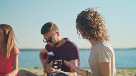 young people having fun on the beach