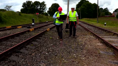 engineers inspecting railway