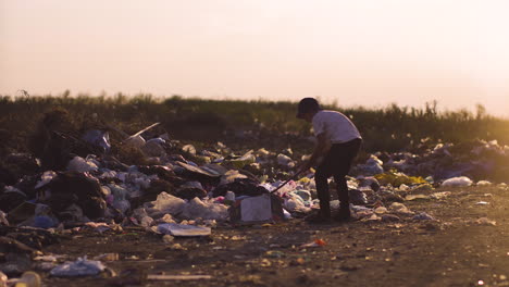 a child playing in a landfill