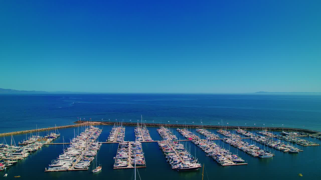 Aerial View of Santa Barbara Harbor Packed with Boats and Yachts on a Clear Summer Day