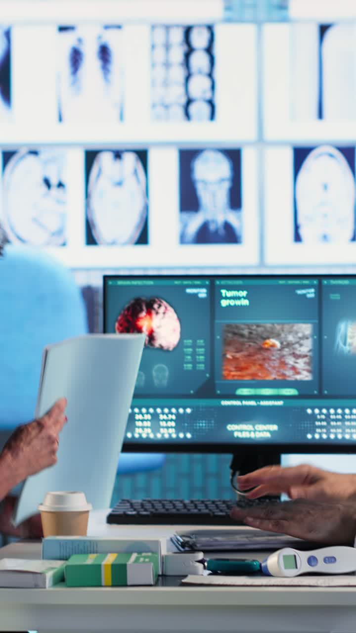 Vertical Video Old specialist meeting with a woman patient to discuss results in a cabinet