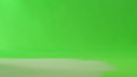 milk spill on green screen