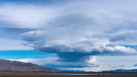 timelapse of cumulonimbus cloud forming above magallanes region landscape in chile