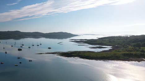 Aerial-footage-flying-out-of-Arisaig-Harbour-towards-Isle-of-Eigg