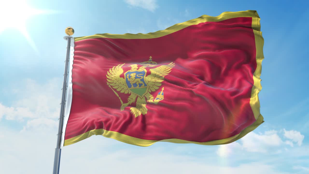 Flaga Czarnogóry powiewająca na wietrze na tle gł��bokiego błękitnego nieba. Motyw narodowy, koncepcja międzynarodowa. 3D Render Seamless Loop 4K