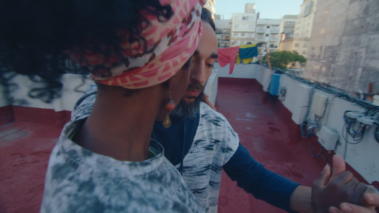 Sensual Partners Dancing Tango on Urban Rooftop