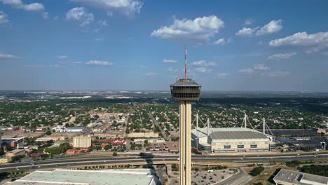 flying away from iconic tower of the americas - observation tower san antonio