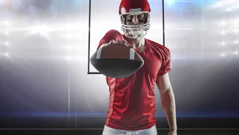 Animation-of-male-american-football-player-holding-ball,-over-goalposts-at-floodlit-stadium