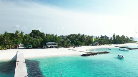 pristine maldives beach of fulidhoo local island, drone reveal