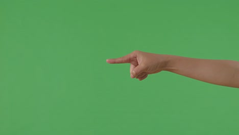 gesto de señalización de la mano en la pantalla verde
