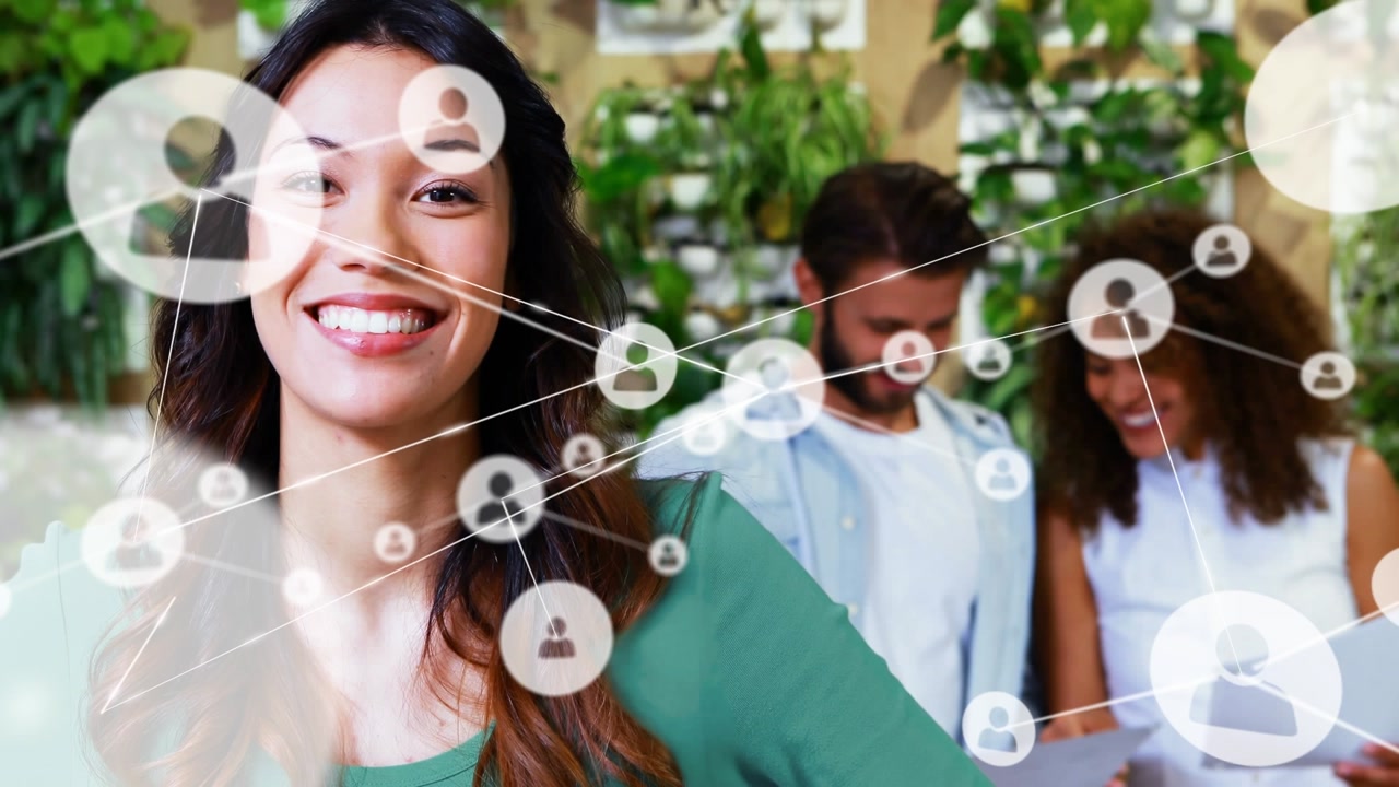 Animation of network of connections with people icons over smiling caucasian businesswoman