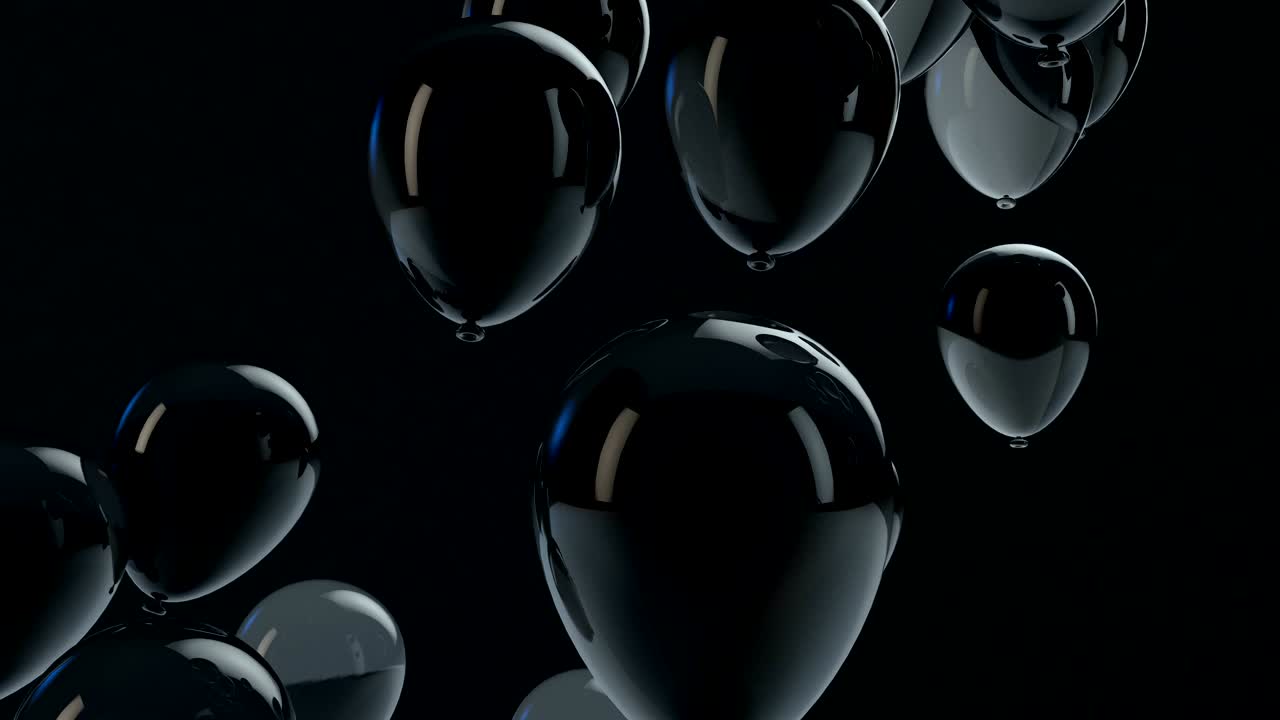 Black balloon floating in the air