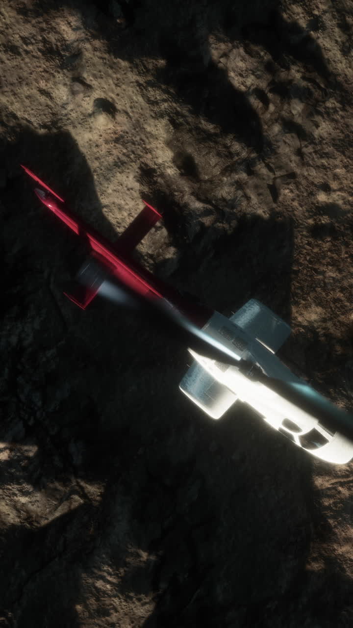 바위 지형 위에 떠다니는 빨간색과 색 헬리터