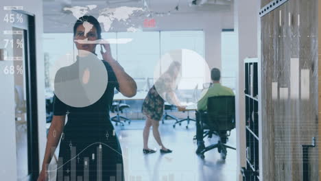 animation of statistical data processing against caucasian woman talking on smartphone at office