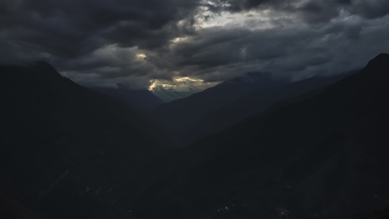 Timelapse of Andes Mountains landscape in Bolivia. Time lapse of sunlight and sun rays filling valley and rainforest scenery in South America