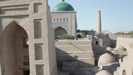 aerial drone point of the itchan kala and islam khodja minaret at old walled city of khiva in uzbekistan