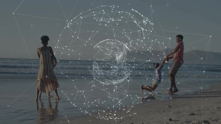 Man raising swing lifting child for play while woman walking child on shore, tech globe appearing