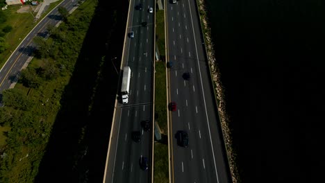 QEW-Burlington-Hamilton-overlooking-Jimmy-Lomax-Park-Beach-Blvd-Eastport-Drive-sunny-summer-day-with-light-traffic-at-Hamilton-Harbour-parallax-angled-overpass-stunning-view1-2