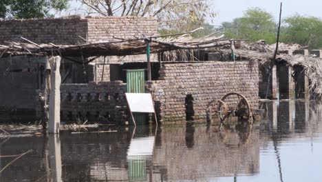 view of ruined buildings in rural sindh submerged due to recent floodings