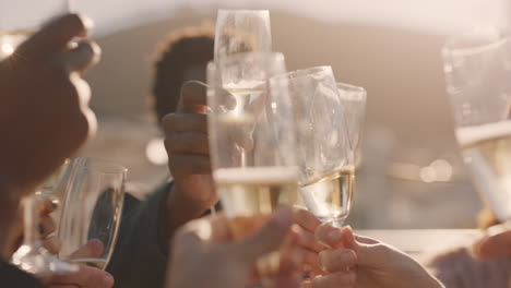 close-up-happy-group-of-friends-making-toast-drinking-champagne-celebrating-rooftop-party-enjoying-diverse-reunion-celebration-on-weekend-social-gathering-at-sunset